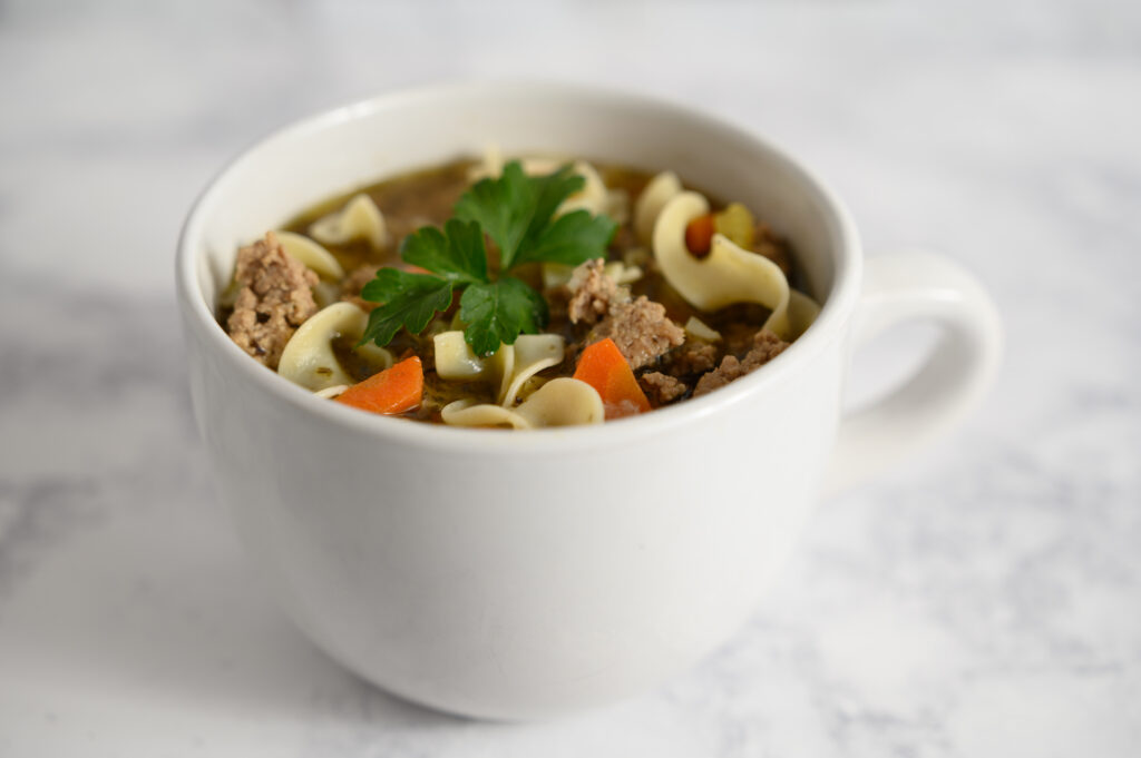 Delicious bowl of ground turkey noodle soup