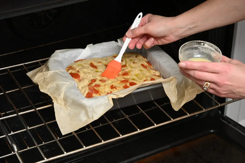 brush with melted butter and garlic seasoning